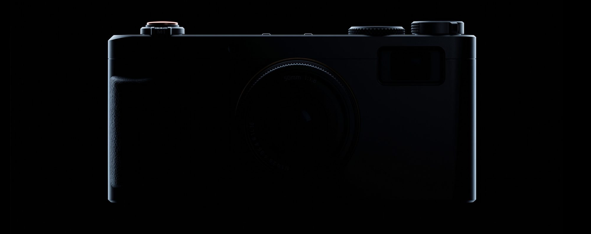 The Project Nova camera, a dark wide-bodied camera lit from above against black